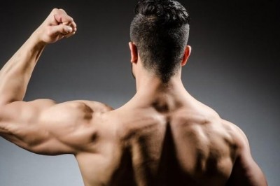 Sennik: biceps, sen o bicepsie, umięśniona ręka.